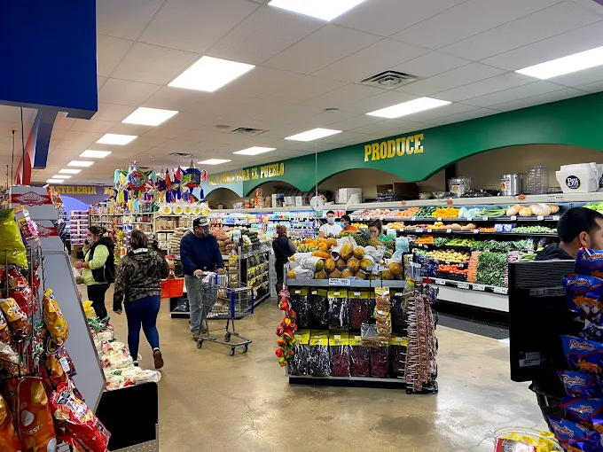Customers shopping inside the market